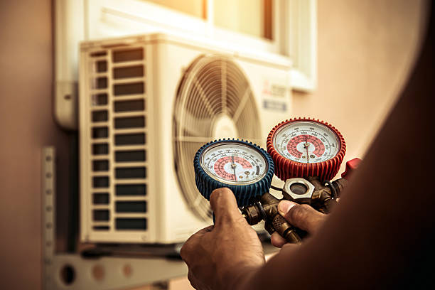 Professional Air Conditioning Service technician working in Cape Neddick, ME